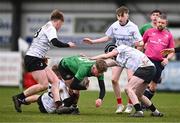 14 February 2024; Zak Hernan of South East is tackled by Midlands players, from left, Callum Brennan, Conor Casey and Conor Clarke during the BearingPoint Shane Horgan Cup Round 4 match between Midlands and South East at Ashbourne RFC in Meath. Photo by Ben McShane/Sportsfile