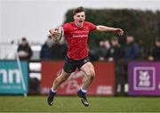 14 February 2024; Lorcan Craik of North East celebrates on his way to scoring a try during the BearingPoint Shane Horgan Cup Round 4 match between Metro and North East at Ashbourne RFC in Meath. Photo by Ben McShane/Sportsfile