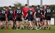 14 February 2024; Players of both side's shake hands after the BearingPoint Shane Horgan Cup Round 4 match between Metro and North East at Ashbourne RFC in Meath. Photo by Ben McShane/Sportsfile