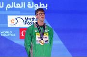14 February 2024; Daniel Wiffen of Ireland on the podium with his gold medal after winning the Men's 800m freestyle final during day four of the World Aquatics Championships 2024 at the Aspire Dome in Doha, Qatar. Photo by Ian MacNicol/Sportsfile