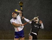 14 February 2024; Ronan Power of MICL in action against Jamie Harkin of SETU Waterford during the Electric Ireland Higher Education GAA Fitzgibbon Cup semi-final match between Mary Immaculate College Limerick and SETU Waterford at Mallow GAA Complex in Cork. Photo by Piaras Ó Mídheach/Sportsfile