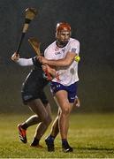 14 February 2024; Ronan Power of MICL in action against Jamie Harkin of SETU Waterford during the Electric Ireland Higher Education GAA Fitzgibbon Cup semi-final match between Mary Immaculate College Limerick and SETU Waterford at Mallow GAA Complex in Cork. Photo by Piaras Ó Mídheach/Sportsfile