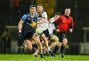 14 February 2024; Diarmuid Moriarty of UCD in action against Niall Loughlin of Ulster University during the Electric Ireland Higher Education GAA Sigerson Cup final match between UCD and Ulster University at Austin Stack Park in Tralee, Kerry. Photo by Brendan Moran/Sportsfile