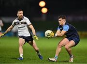 14 February 2024; Liam Smith of UCD in action against Niall Loughlin of Ulster University during the Electric Ireland Higher Education GAA Sigerson Cup final match between UCD and Ulster University at Austin Stack Park in Tralee, Kerry. Photo by Brendan Moran/Sportsfile