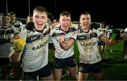14 February 2024; Ulster University players, from left, Ruairi Canavan, Ronan McCaffrey and Darragh Canavan celebrate victory after the Electric Ireland Higher Education GAA Sigerson Cup final match between UCD and Ulster University at Austin Stack Park in Tralee, Kerry. Photo by Brendan Moran/Sportsfile