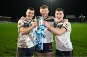 14 February 2024; Ulster University players, from left, Darragh Canavan, Peter Og McCartan  and Ruairi Canavan celebrate with the Sigerson Cup after the Electric Ireland Higher Education GAA Sigerson Cup final match between UCD and Ulster University at Austin Stack Park in Tralee, Kerry. Photo by Brendan Moran/Sportsfile