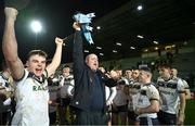 14 February 2024; Ulster University selector Paul Rouse, and captain Ryan Magill, left, celebrate with the Sigerson Cup after the Electric Ireland Higher Education GAA Sigerson Cup final match between UCD and Ulster University at Austin Stack Park in Tralee, Kerry. Photo by Brendan Moran/Sportsfile