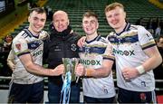 14 February 2024; Darragh Canavan, left, and Ruairi Canavan of Ulster University celebrate with their father, former Tyrone legend Peter Canavan and teammate Peter Og McCartan, right, after victory in the Electric Ireland Higher Education GAA Sigerson Cup final match between UCD and Ulster University at Austin Stack Park in Tralee, Kerry. Photo by Brendan Moran/Sportsfile