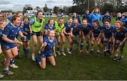 15 February 2024; Leinster players, lead by captain Alex Connor, bottom, celebrate after their side's victory in the U18 Girls Interprovincial semi-final match between Leinster and Munster at Terenure College RFC in Dublin. Photo by Seb Daly/Sportsfile