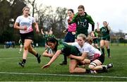 15 February 2024; Merisa Kiripati of Connacht scores her side's fourth try, despite the tackle of Ulster's Laura Scott, during the U18 Girls Interprovincial semi-final match between Ulster and Connacht at Terenure College RFC in Dublin. Photo by Seb Daly/Sportsfile