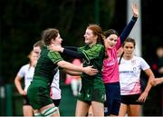 15 February 2024; Jemima Adams Verling of Connacht, left, celebrates with teammate Jemma Lees after scoring their side's fifth try, and her third personal try, during the U18 Girls Interprovincial semi-final match between Ulster and Connacht at Terenure College RFC in Dublin. Photo by Seb Daly/Sportsfile