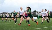 15 February 2024; Emily Foley of Connacht on her way to scoring her side's sixth try during the U18 Girls Interprovincial semi-final match between Ulster and Connacht at Terenure College RFC in Dublin. Photo by Seb Daly/Sportsfile