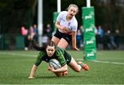 15 February 2024; Emily Foley of Connacht scores her side's sixth try during the U18 Girls Interprovincial semi-final match between Ulster and Connacht at Terenure College RFC in Dublin. Photo by Seb Daly/Sportsfile