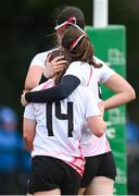 15 February 2024; Aoibhín Smith of Ulster, left, is consoled by teammate Megan Creighton after their side conceded a sixth try during the U18 Girls Interprovincial semi-final match between Ulster and Connacht at Terenure College RFC in Dublin. Photo by Seb Daly/Sportsfile