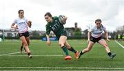 15 February 2024; Emily Foley of Connacht on her way to scoring her side's third try during the U18 Girls Interprovincial semi-final match between Ulster and Connacht at Terenure College RFC in Dublin. Photo by Seb Daly/Sportsfile