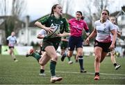 15 February 2024; Saoirse Lawley of Connacht on her way to scoring her side's seventh try during the U18 Girls Interprovincial semi-final match between Ulster and Connacht at Terenure College RFC in Dublin. Photo by Shauna Clinton/Sportsfile