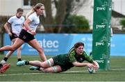 15 February 2024; Jemima Adams Verling of Connacht scores her side's fifth try during the U18 Girls Interprovincial semi-final match between Ulster and Connacht at Terenure College RFC in Dublin. Photo by Shauna Clinton/Sportsfile