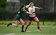 15 February 2024; Leah Irwin of Ulster in action against Meabh Flannery of Connacht during the U18 Girls Interprovincial semi-final match between Ulster and Connacht at Terenure College RFC in Dublin. Photo by Seb Daly/Sportsfile