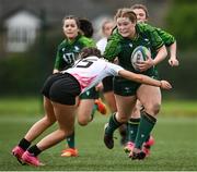15 February 2024; Sarah Purcell of Connacht is tackled by Natalie Turner of Ulster during the U18 Girls Interprovincial semi-final match between Ulster and Connacht at Terenure College RFC in Dublin. Photo by Seb Daly/Sportsfile