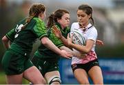 15 February 2024; Natalie Turner of Ulster is tackled by Chloe Conneely of Connacht during the U18 Girls Interprovincial semi-final match between Ulster and Connacht at Terenure College RFC in Dublin. Photo by Seb Daly/Sportsfile