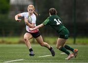 15 February 2024; Erin McConalogue of Ulster in action against Saoirse Lawley of Connacht during the U18 Girls Interprovincial semi-final match between Ulster and Connacht at Terenure College RFC in Dublin. Photo by Seb Daly/Sportsfile