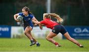 15 February 2024; Emma Brogan of Leinster in action against Lyndsay Clarke of Munster during the U18 Girls Interprovincial semi-final match between Leinster and Munster at Terenure College RFC in Dublin. Photo by Seb Daly/Sportsfile