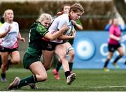 15 February 2024; Amy McConkey of Ulster is tackled by Aoife Heaney of Connacht during the U18 Girls Interprovincial semi-final match between Ulster and Connacht at Terenure College RFC in Dublin. Photo by Shauna Clinton/Sportsfile