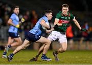 3 February 2024; Lee Gannon of Dublin and Donnacha McHugh of Mayo during the Allianz Football League Division 1 match between Mayo and Dublin at Hastings Insurance MacHale Park in Castlebar, Mayo. Photo by Stephen McCarthy/Sportsfile