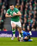 11 February 2024; Robbie Henshaw of Ireland is tackled by Juan Ignacio Brex of Italy during the Guinness Six Nations Rugby Championship match between Ireland and Italy at the Aviva Stadium in Dublin. Photo by Ben McShane/Sportsfile