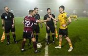 16 February 2024; Referee Eoghan O'Shea with team captains Conor McCormack of Galway United and Joe Redmond of St Patrick's Athletic before the SSE Airtricity Men's Premier Division match between Galway United and St Patrick's Athletic at Eamonn Deacy Park in Galway. Photo by Seb Daly/Sportsfile