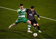 16 February 2024; Ryan O'Kane of Dundalk in action against Neil Farrugia of Shamrock Rovers during the SSE Airtricity Men's Premier Division match between Shamrock Rovers and Dundalk at Tallaght Stadium in Dublin. Photo by Stephen McCarthy/Sportsfile