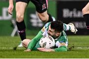 16 February 2024; (EDITOR'S NOTE; Image contains graphic content) Neil Farrugia of Shamrock Rovers lands on his arm following a tackle from Zak Bradshaw of Dundalk, left, during the SSE Airtricity Men's Premier Division match between Shamrock Rovers and Dundalk at Tallaght Stadium in Dublin. Photo by Ben McShane/Sportsfile