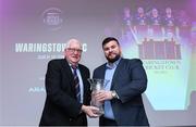 16 February 2024; President of Warringstown Cricket Club Tommy Anderson is presented with the Club of the Year award by Jack Ginnelly from Arachas during the 12th Business Plus Irish Cricket Awards 2024 at Clontarf Castle Hotel in Dublin. Photo by Matt Browne/Sportsfile