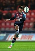 16 February 2024; Joey Carbery of Munster kicks the conversion during the United Rugby Championship match between Scarlets and Munster at Parc y Scarlets in Llanelli, Wales. Photo by Chris Fairweather/Sportsfile