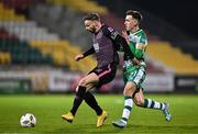 16 February 2024; Andy Boyle of Dundalk in action against Darragh Burns of Shamrock Rovers during the SSE Airtricity Men's Premier Division match between Shamrock Rovers and Dundalk at Tallaght Stadium in Dublin. Photo by Ben McShane/Sportsfile