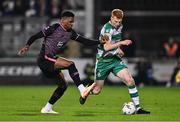 16 February 2024; Rory Gaffney of Shamrock Rovers in action against Mayowa Animasahun of Dundalk during the SSE Airtricity Men's Premier Division match between Shamrock Rovers and Dundalk at Tallaght Stadium in Dublin. Photo by Ben McShane/Sportsfile