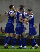 16 February 2024; Treaty United players celebrate their side’s first goal, an own goal by Brendeán Frahill of Cobh Ramblers, not pictured, during the SSE Airtricity Men's First Division match between Treaty United and Cobh Ramblers at Markets Field in Limerick. Photo by Tom Beary/Sportsfile