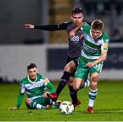 16 February 2024; Conan Noonan of Shamrock Rovers in action against Archie Davies of Dundalk during the SSE Airtricity Men's Premier Division match between Shamrock Rovers and Dundalk at Tallaght Stadium in Dublin. Photo by Stephen McCarthy/Sportsfile