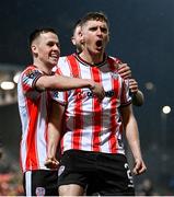 16 February 2024; Ronan Boyce of Derry City celebrates with Ben Doherty, left, after scoring their side's first goal during the SSE Airtricity Men's Premier Division match between Derry City and Drogheda United at The Ryan McBride Brandywell Stadium in Derry. Photo by Ramsey Cardy/Sportsfile