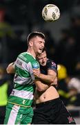 16 February 2024; Josh Honohan of Shamrock Rovers in action against Jamie Gullan of Dundalk during the SSE Airtricity Men's Premier Division match between Shamrock Rovers and Dundalk at Tallaght Stadium in Dublin. Photo by Stephen McCarthy/Sportsfile