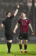 16 February 2024; Stephen Walsh of Galway United is shown a red card by referee Eoghan O'Shea during the SSE Airtricity Men's Premier Division match between Galway United and St Patrick's Athletic at Eamonn Deacy Park in Galway. Photo by Seb Daly/Sportsfile