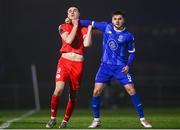 16 February 2024; Sean Boyd of Shelbourne and Grant Horton of Waterford tussle before Sean Boyd of Shelbourne is shown a red card during the SSE Airtricity Men's Premier Division match between Waterford and Shelbourne at the Regional Sports Centre in Waterford. Photo by Harry Murphy/Sportsfile