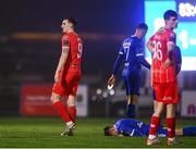 16 February 2024; Sean Boyd of Shelbourne after being shown a red card for a tussle with Grant Horton of Waterford, on the floor, during the SSE Airtricity Men's Premier Division match between Waterford and Shelbourne at the Regional Sports Centre in Waterford. Photo by Harry Murphy/Sportsfile
