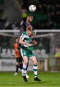 16 February 2024; Rory Gaffney of Shamrock Rovers in action against Mayowa Animasahun of Dundalk during the SSE Airtricity Men's Premier Division match between Shamrock Rovers and Dundalk at Tallaght Stadium in Dublin. Photo by Ben McShane/Sportsfile