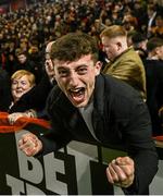 16 February 2024; Bohemians supporters celebrate their side's second goal during the SSE Airtricity Men's Premier Division match between Bohemians and Sligo Rovers at Dalymount Park in Dublin. Photo by David Fitzgerald/Sportsfile
