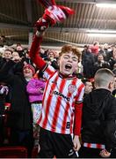 16 February 2024; Derry City supporters celebrate their second goal during the SSE Airtricity Men's Premier Division match between Derry City and Drogheda United at The Ryan McBride Brandywell Stadium in Derry. Photo by Ramsey Cardy/Sportsfile