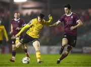 16 February 2024; Jay McClelland of St Patrick's Athletic in action against Patrick Hickey of Galway United during the SSE Airtricity Men's Premier Division match between Galway United and St Patrick's Athletic at Eamonn Deacy Park in Galway. Photo by John Sheridan/Sportsfile