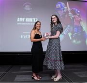 16 February 2024; Amy Hunter of Dragons is presented with the Evoke Super Series Player of the Year award by Bryony Jewell from Evoke during the 12th Business Plus Irish Cricket Awards 2024 at Clontarf Castle Hotel in Dublin. Photo by Matt Browne/Sportsfile