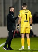 16 February 2024; Shamrock Rovers sporting director Stephen McPhail speaks to goalkeeper Leon Pohls in a break in play during the SSE Airtricity Men's Premier Division match between Shamrock Rovers and Dundalk at Tallaght Stadium in Dublin. Photo by Stephen McCarthy/Sportsfile
