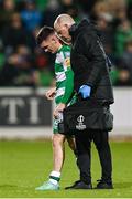 16 February 2024; Trevor Clarke of Shamrock Rovers leaves the pitch with physiotherapist Tony McCarthy after picking up an injury during the SSE Airtricity Men's Premier Division match between Shamrock Rovers and Dundalk at Tallaght Stadium in Dublin. Photo by Stephen McCarthy/Sportsfile